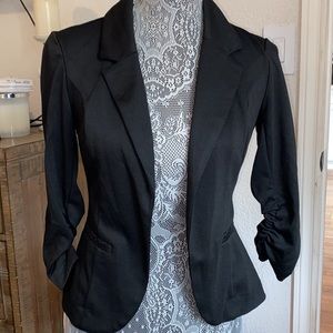 Candie’s black lace blazer